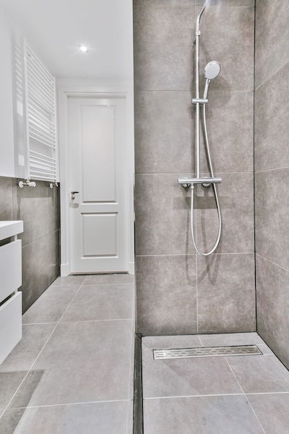 Modern shower stall in a bright bathroom