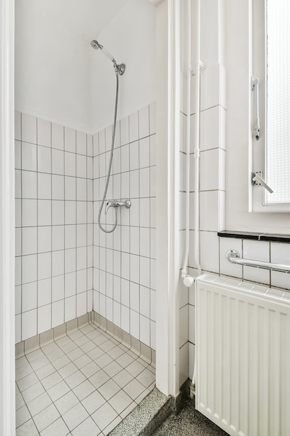 Modern shower stall in a bright bathroom