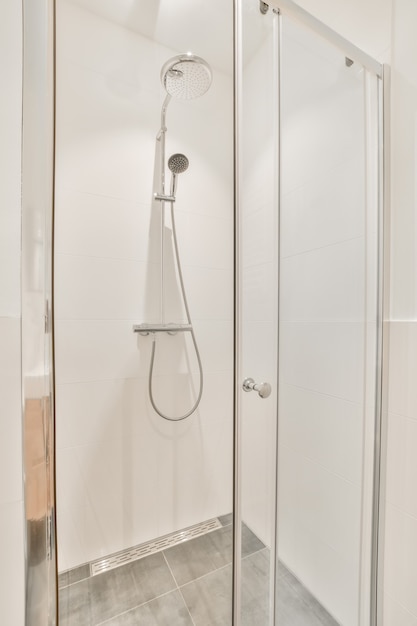 Modern shower stall in a bright bathroom