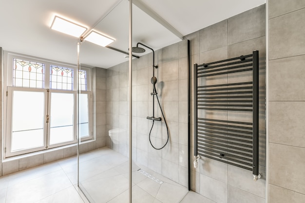 Modern shower stall in a bright bathroom