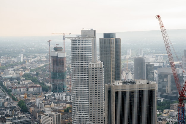 Modern skyscrapers of the developing business center of the metropolis. Construction