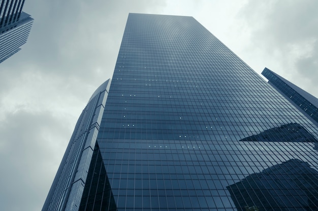 Modern skyscrapers and dramatic rainy sky over them