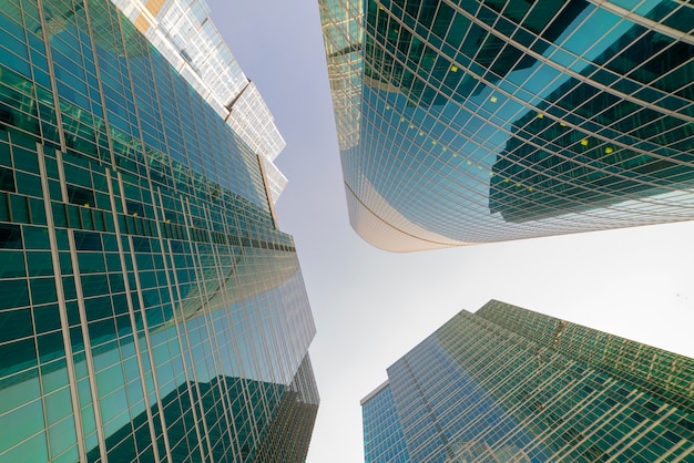 Modern skyscrapers - high-rise buildings in the down town. Bottom view.