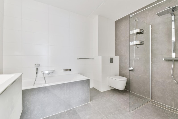 Modern and sleek bathroom with gray tiled floor