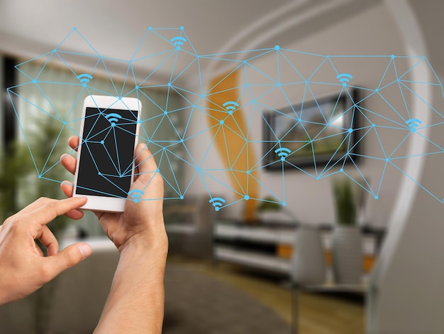 modern smarthome living room controlled by man holding a smartphone            - Image