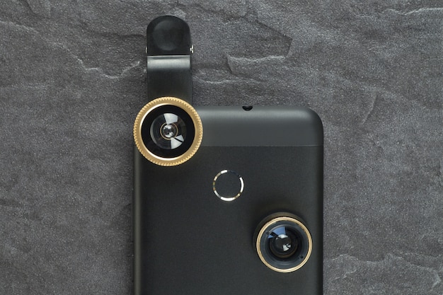 Modern smartphone with an extra lens. The view from the top.