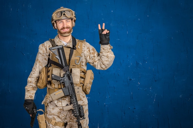 Photo modern soldier with gun