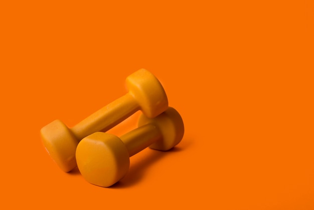 Modern sport composition with dumbbell