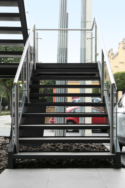 Photo modern stairs with metal handrailings on city street