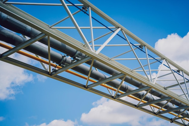 Modern steam pipeline for industrial on blue skies background