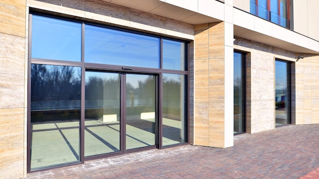 modern storefront with automatic sliding glass doors