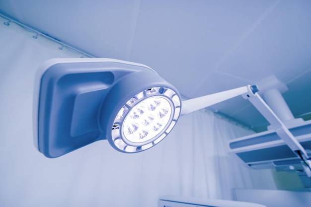 Modern surgical lighting equipment lamps in operating room in clinic or hospital