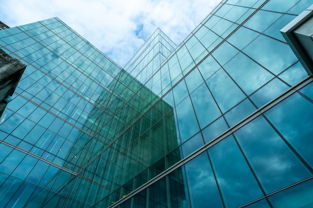 Modern sustainable green glass office building Exterior view of corporate headquarters building