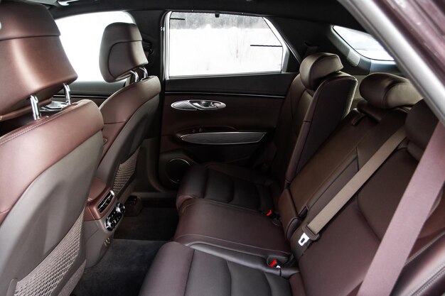 Modern SUV car inside Leather light back passenger seats in modern luxury car Comfortable leather seats