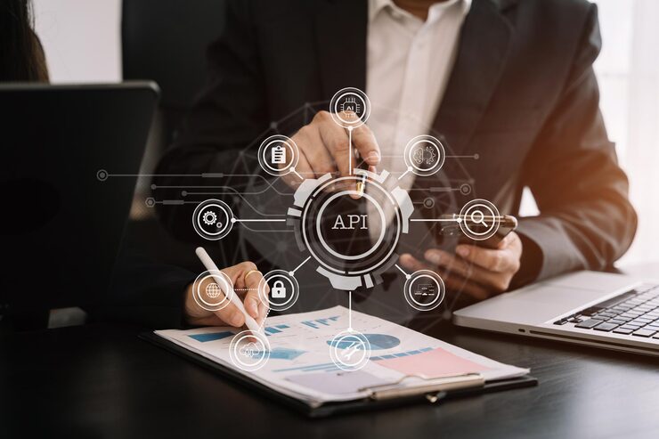 Photo modern technology and networking concept business team using laptop tablet and smartphone with virtual screen api icon software development tool api application programming