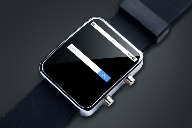 modern technology, object and media concept - close up of black smart watch internet browser search bar on screen