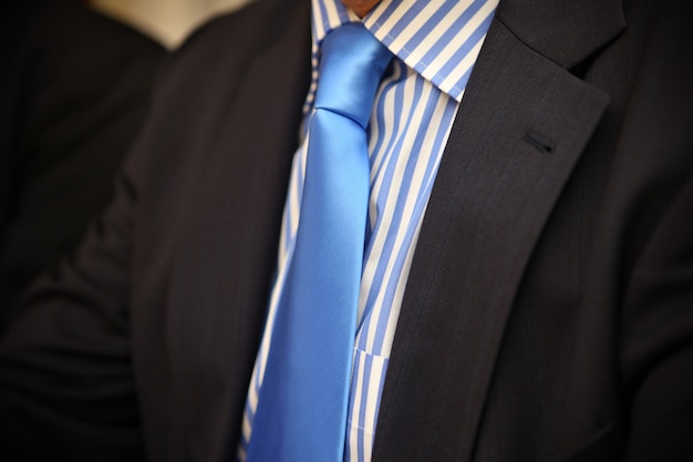 Modern tie closup with striped shirt