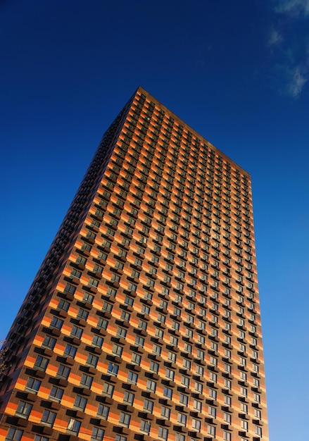 Modern tower building during daylight backdrop