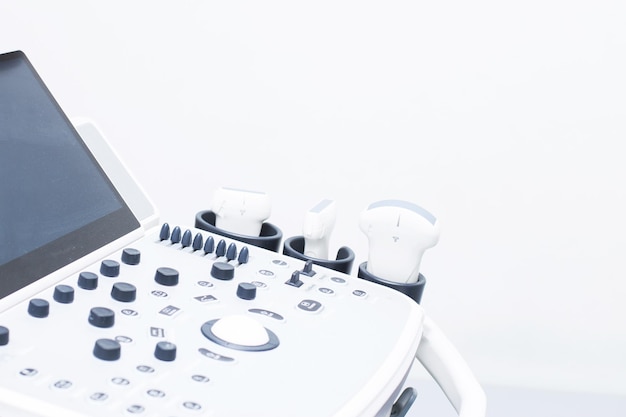 Photo modern ultrasound machine scanners and sensors closeup medical equipment in the clinic ultrasound scanning diagnostic health care and medicine concept