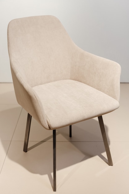 Modern velours armchair in a room