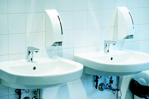 Modern white bathroom sink with faucet