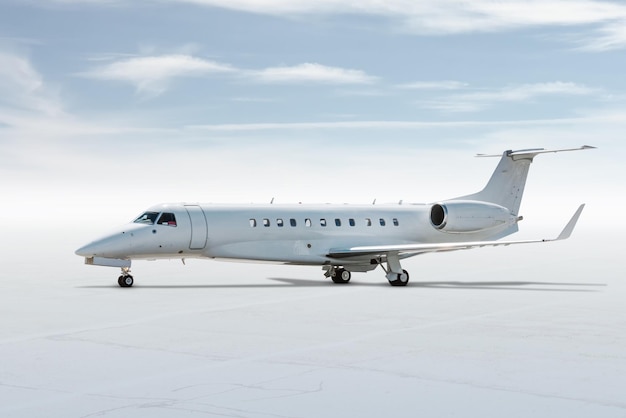 Modern white corporate business jet isolated on light background with sky