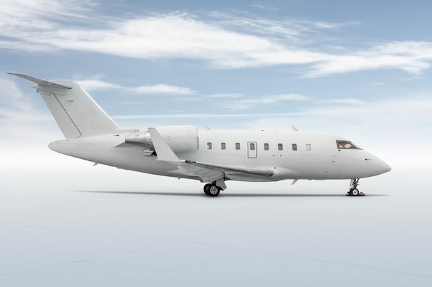 Modern white corporate business jet isolated on light background with sky