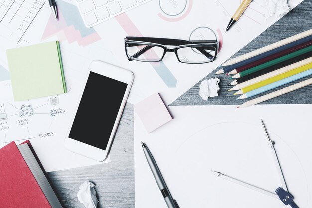 Modern white desk top with items