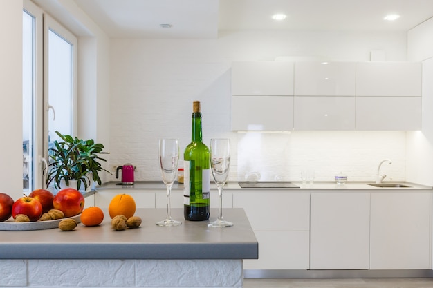 Modern white kitchen without handles