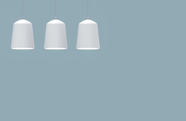 Modern white lamp hanging on blue wall background.