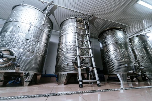 Modern winery with metal barrels