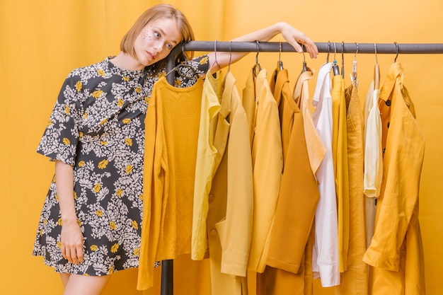 Modern woman next to wardrobe