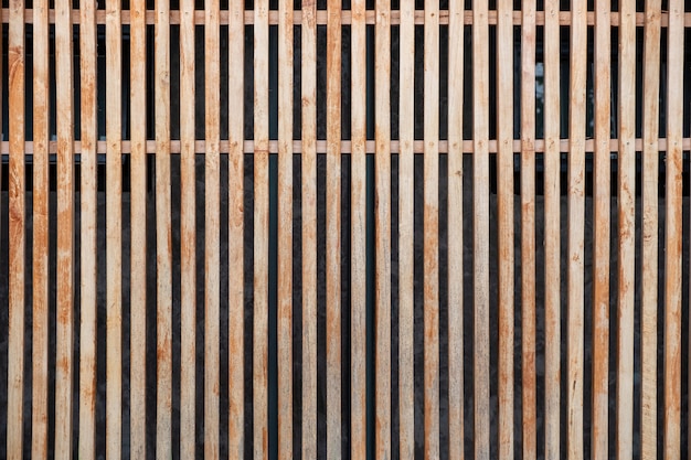 Modern wooden brown lath decoration on facade