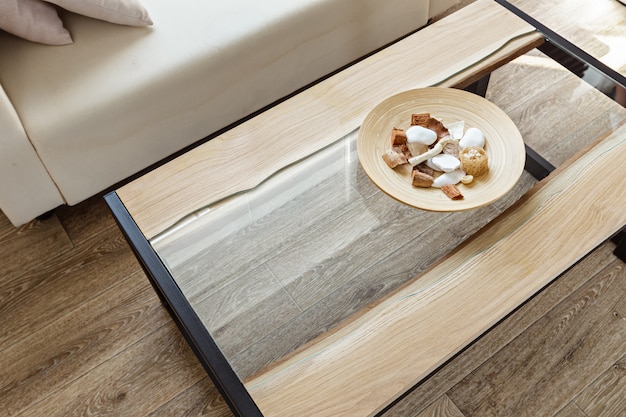 Modern wooden table in the loft interior