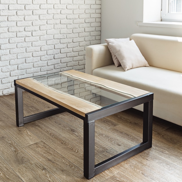 Modern wooden table in the loft interior