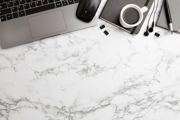 Modern workplace arrangement on marble background