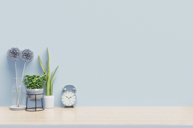 Современное рабочее место с креативным столом с растениями имеет синюю стену, 3d-рендеринг