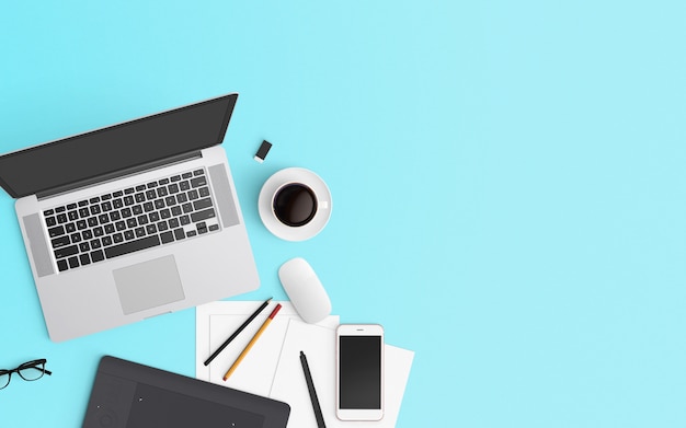 Modern workspace with coffee cup, notebook, smartphone and laptop on Blue color