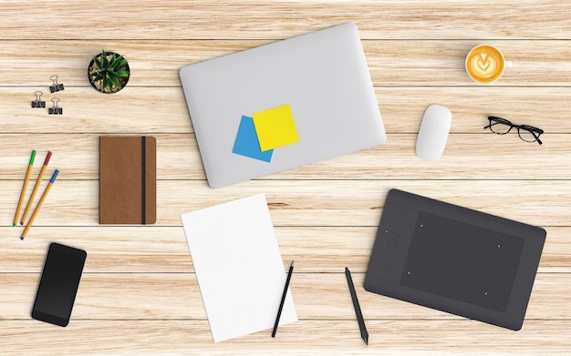 Modern workspace with coffee cup, paper, notebook, tablet or smartphone and laptop on wood
