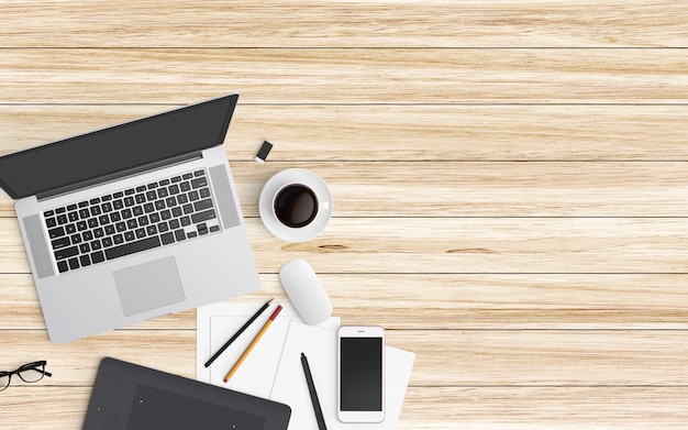 Modern workspace with coffee cup, paper, notebook, tablet or smartphone and laptop on wood