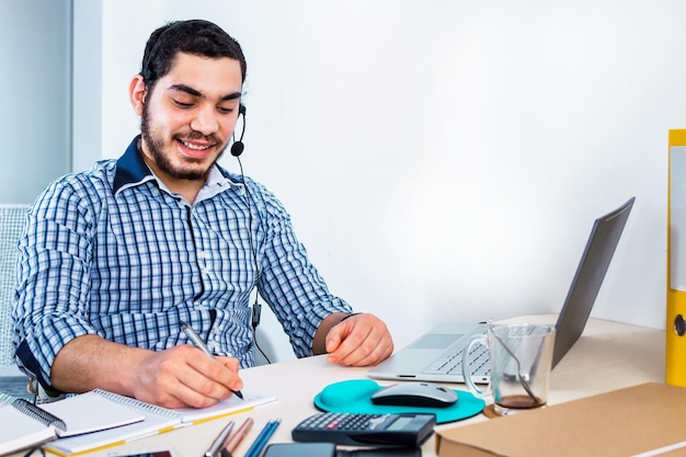 Modern young man working remotely from home