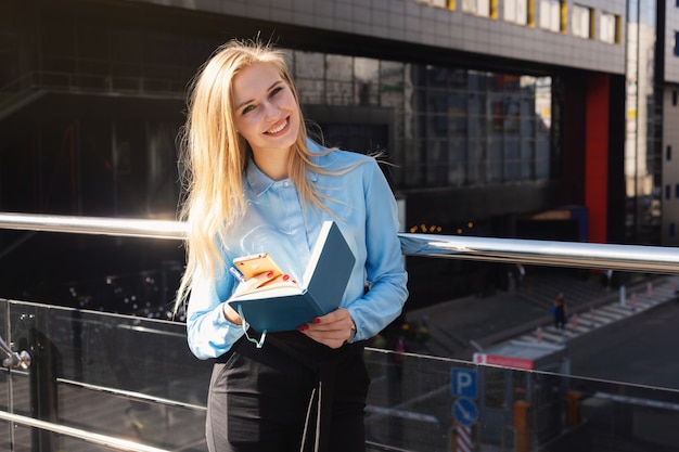 Modern young woman in a big city