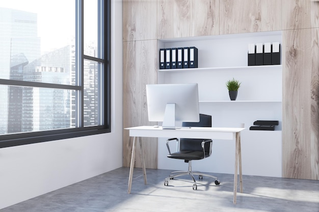 Foto moderne baaskantoorhoek met een computerbureau, planken met mappen en kantoorbenodigdheden en een raam. 3d-rendering mock-up