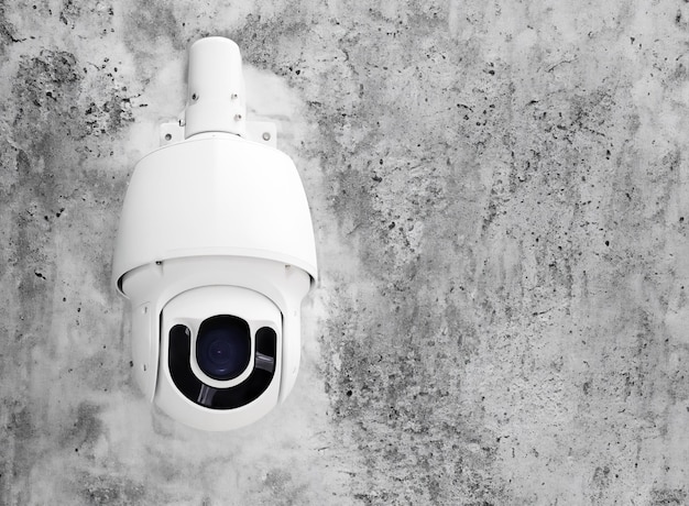 Foto moderne openbare cctv-camera's op een cementmuur met kopieerruimte en knippad