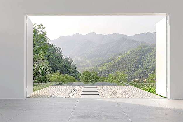 Moderne witte lege kamer met open schuifdeur naar het terras met uitzicht op de natuur