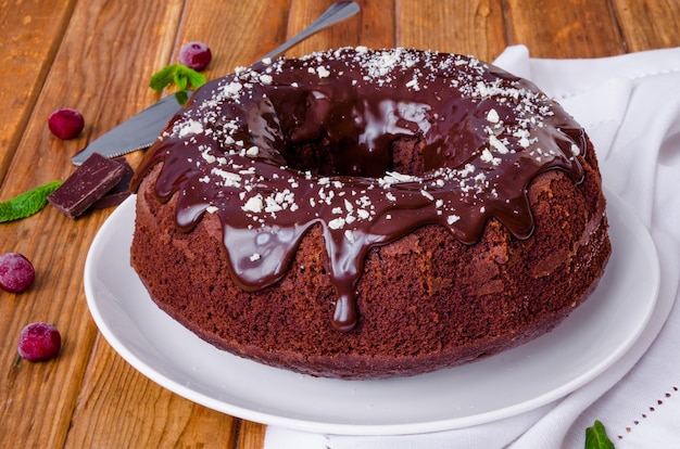 Moist chocolate cake with cherry and glaze