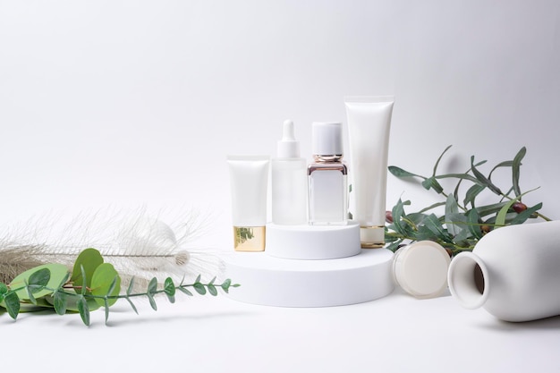 Moisturizing cream bottle over leaf background studio packing and skincare beauty conceptx9