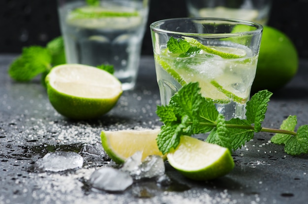 Mojito cocktail in a bur on a rustic table