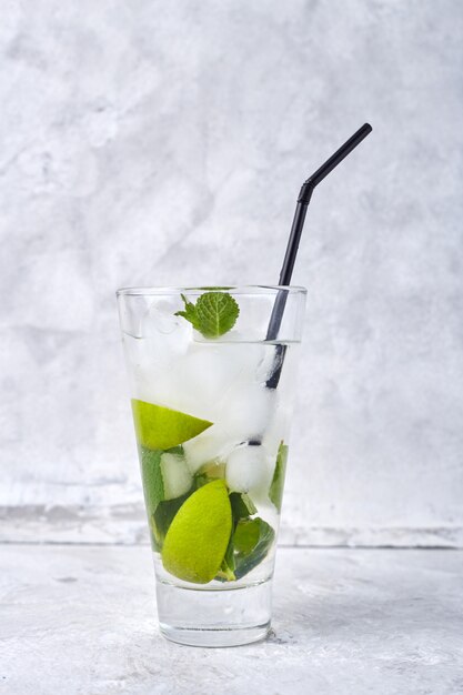 Mojito cocktail on the grey concrete