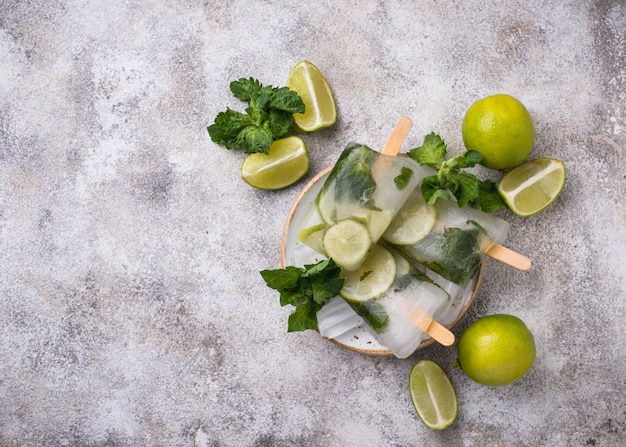 Mojito cocktail popsicle with mint, lime and rum 